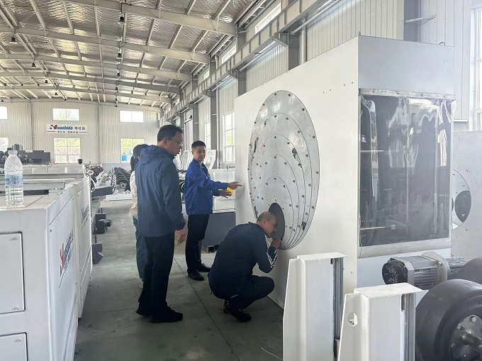 为提高生产效率海隆公司从华仕达采购弯头抛丸设备